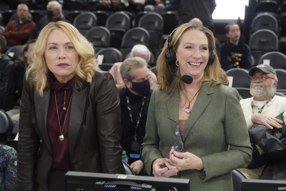 FILE - ESPN's Doris Burke and Beth Mowins look on before the start of NBA basketball game between the Utah Jazz and Golden State Warriors Wednesday, Feb. 9, 2022, in Salt Lake City. An all-female ensemble will produce Wednesday's March 8, 2023, game between the Dallas Mavericks and New Orleans Pelicans in New Orleans. It's a way to celebrate International Women’s Day. (AP Photo/Rick Bowmer, File)