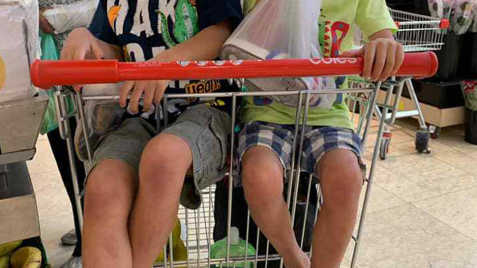 A Sydney mum was told it was 'illegal' to have her children sitting side-by-side in a Coles trolley.