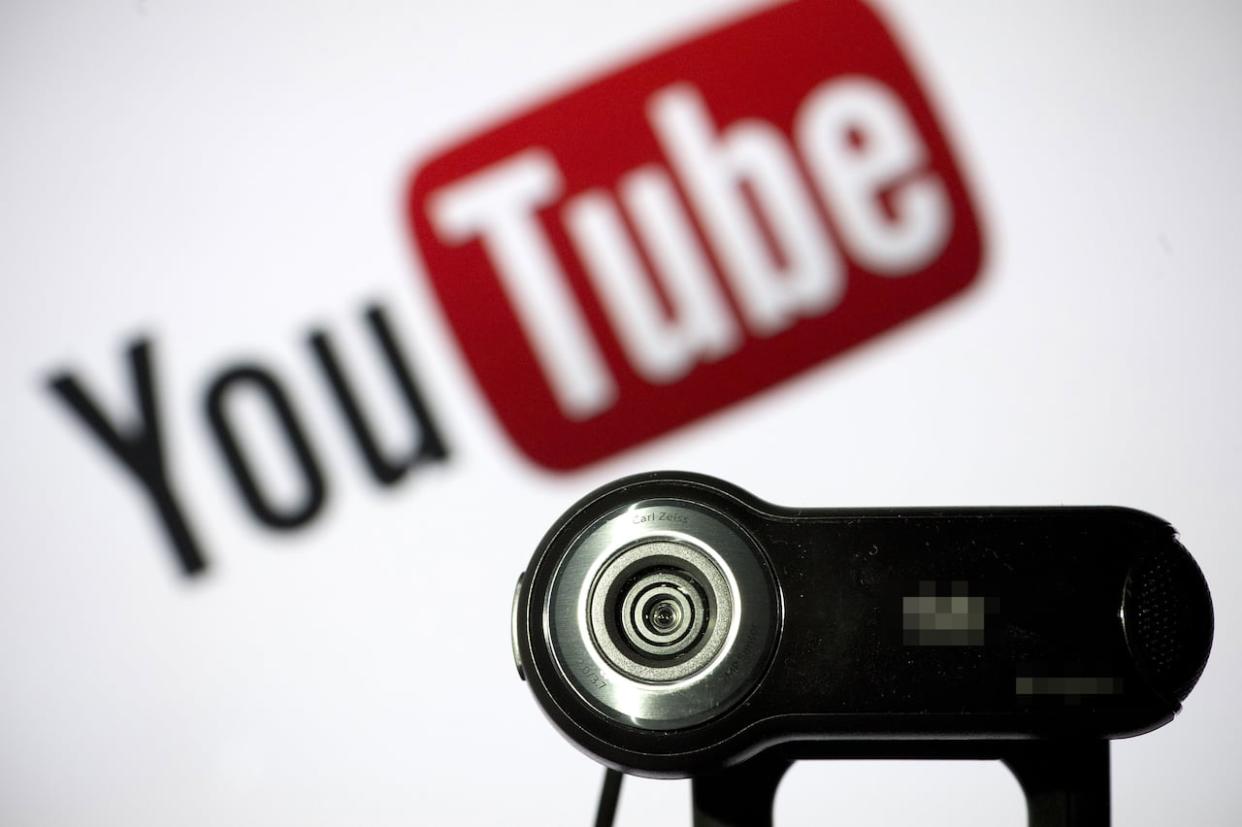 Gleb Glebov lost his job as a sessional instructor at Fraser International College for making YouTube videos the school characterizes as containing 'homophobic/transphobic, misogynistic and other deeply intolerant and discriminatory views.' (Lionel Bonaventure/AFP/Getty Images - image credit)
