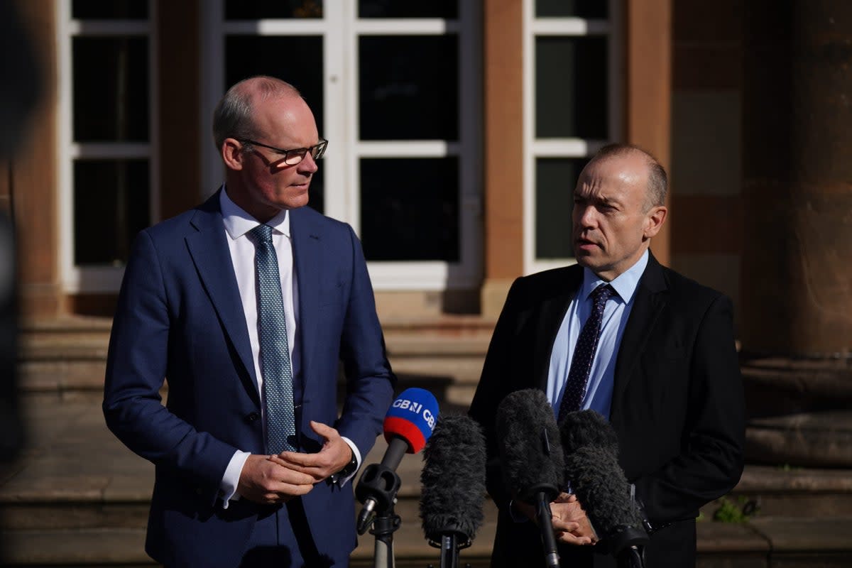 Northern Ireland Secretary Chris Heaton-Harris, right, and Irish Foreign Affairs Minister Simon Coveney have met for talks (Niall Carson/PA) (PA Wire)
