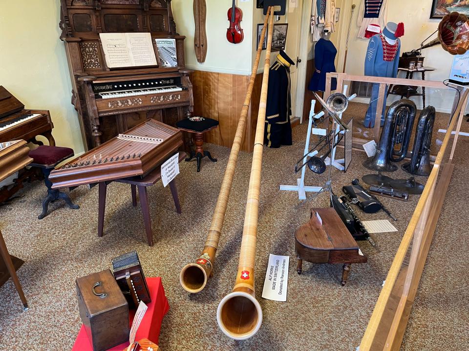 The Alpine Hills Museum in Sugarcreek has two alphorns, center, among its collection of musical instruments.