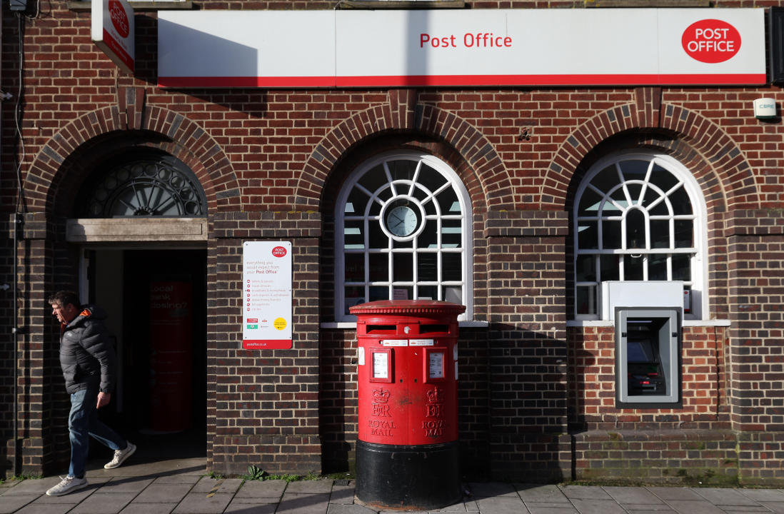 A customer exits a branch of Post Office in Swindon, western England on January 22, 2024. Fujitsu created the Horizon IT system that resulted in some 700 local Post Office managers being wrongly convicted for theft and false accounting between 1999 and 2005. The UK government, which plans to exonerate all victims, has warned the company will be 