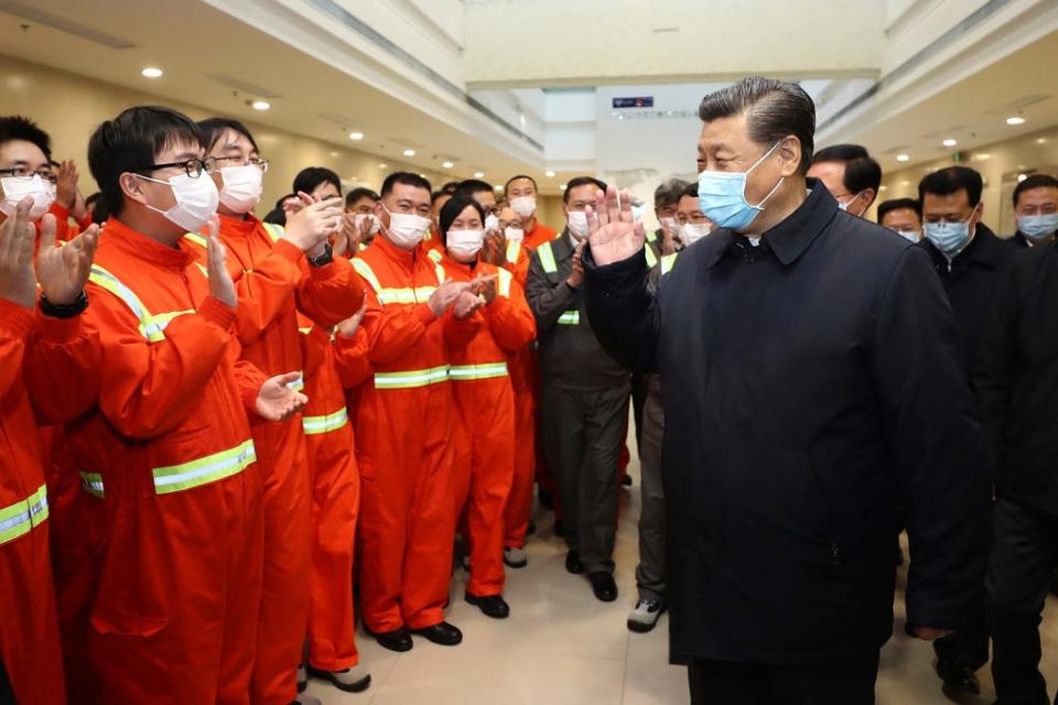 Chinese President Xi Jinping visits the Chuanshan port area in east China's Zhejiang Province on March 29, 2020.