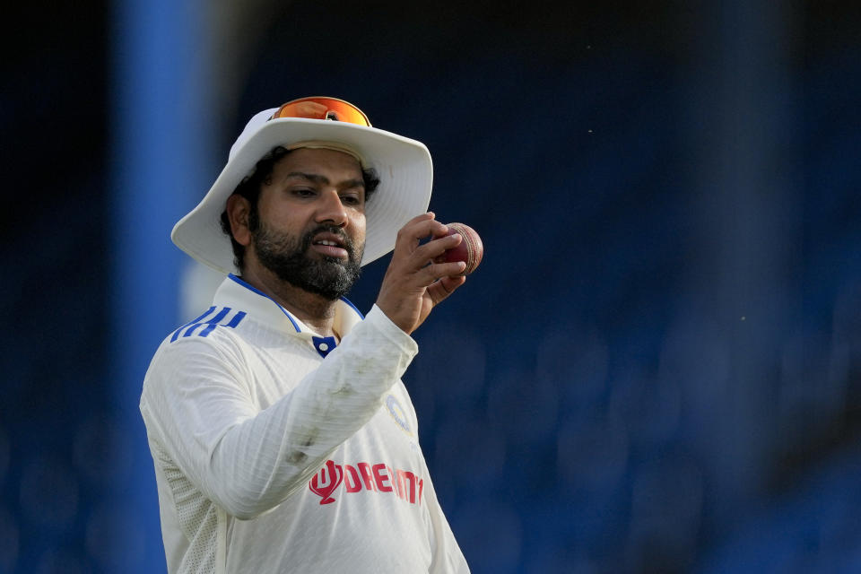 India's captain Rohit Sharma looks at the ball on day four of the second cricket Test match against West Indies at Queen's Park in Port of Spain, Trinidad and Tobago, Sunday, July 23, 2023. (AP Photo/Ricardo Mazalan)