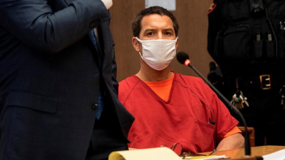 PHOTO: Scott Peterson listens to his attorney Pat Harris during a hearing at the San Mateo County Superior Court in Redwood City, California, Dec. 8, 2021.  (Modesto Bee/TNS/Getty Images, FILE)