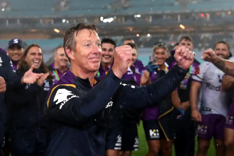 SYDNEY, AUSTRALIA - OCTOBER 25:  Storm coach Craig Bellamy has Gatorade poured over him after winning the 2020 NRL Grand Final match between the Penrith Panthers and the Melbourne Storm at ANZ Stadium on October 25, 2020 in Sydney, Australia. (Photo by Cameron Spencer/Getty Images)