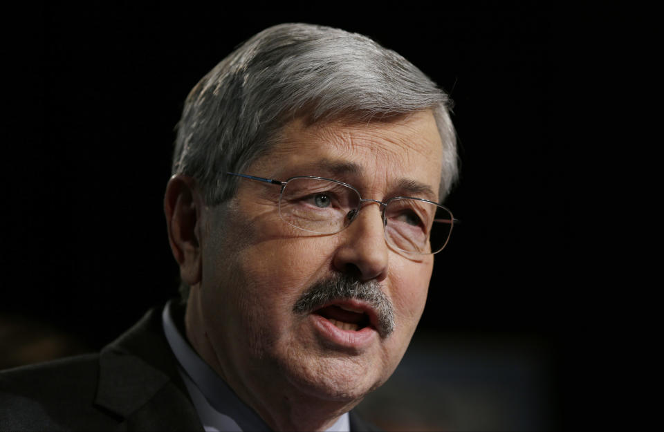 FILE - In this Jan. 14, 2014, file photo, then Iowa Gov. Terry Branstad announces during a rally with supporters his plans to run for another term, in West Des Moines, Iowa. Branstad, the current U.S. ambassador to China, urged Beijing to engage in substantive dialogue with exiled Tibetan Buddhist leader the Dalai Lama during a visit to the Himalayan region over the past week. (AP Photo/Charlie Neibergall, File)