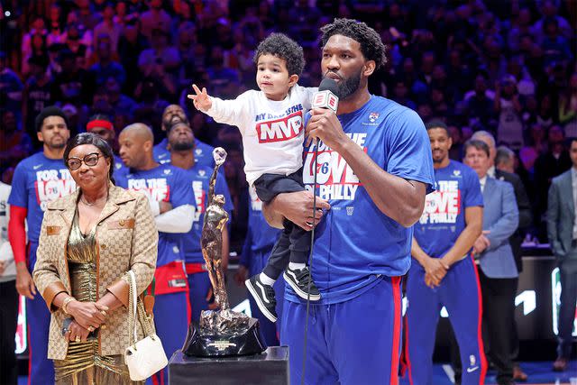 Tim Nwachukwu/Getty Joel Embiid with son Arthur at MVP ceremony