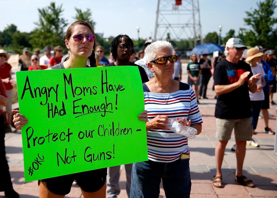 Becky Endicott, left, and Nancy Krause listen to speakers June 11 during the March for Our Lives Rally at the state Capitol in Oklahoma City.