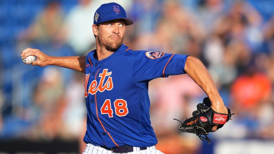 Mar 22, 2022; Port St. Lucie, Florida, USA; New York Mets starting pitcher Jacob deGrom (48) delivers a pitch in the first inning of the spring training game against the Houston Astros at Clover Park.
