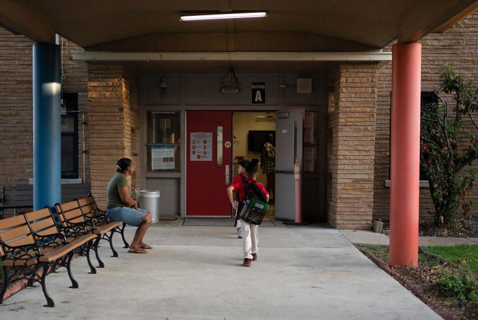 Celina Manzano's children head to school at Pugh Elementary School in East Houston on October 2, 2023.