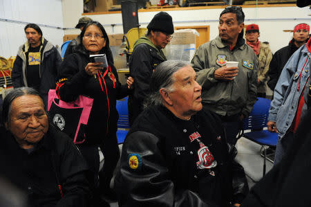 Veterans attend a Sioux tribal welcome meeting at Sitting Bull College as "water protectors" continue to demonstrate against plans to pass the Dakota Access pipeline near the Standing Rock Indian Reservation, in Fort Yates, North Dakota, U.S. December 3, 2016. REUTERS/Stephanie Keith