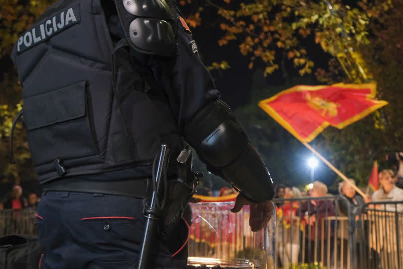 People protest against new speaker of parliament Andrija Mandic in front of parliament building in Montenegro's capital Podgorica, Monday, Oct. 30, 2023.