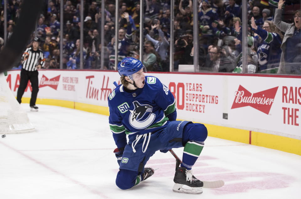 Vancouver Canucks' Adam Gaudette celebrates his goal against the Chicago Blackhawks during the second period of an NHL hockey game Wednesday, Feb. 12, 2020, in Vancouver, British Columbia. (Darryl Dyck/The Canadian Press via AP)