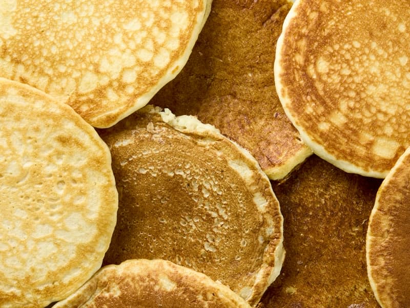 overhead shot of a bunch of pancakes in a stack.