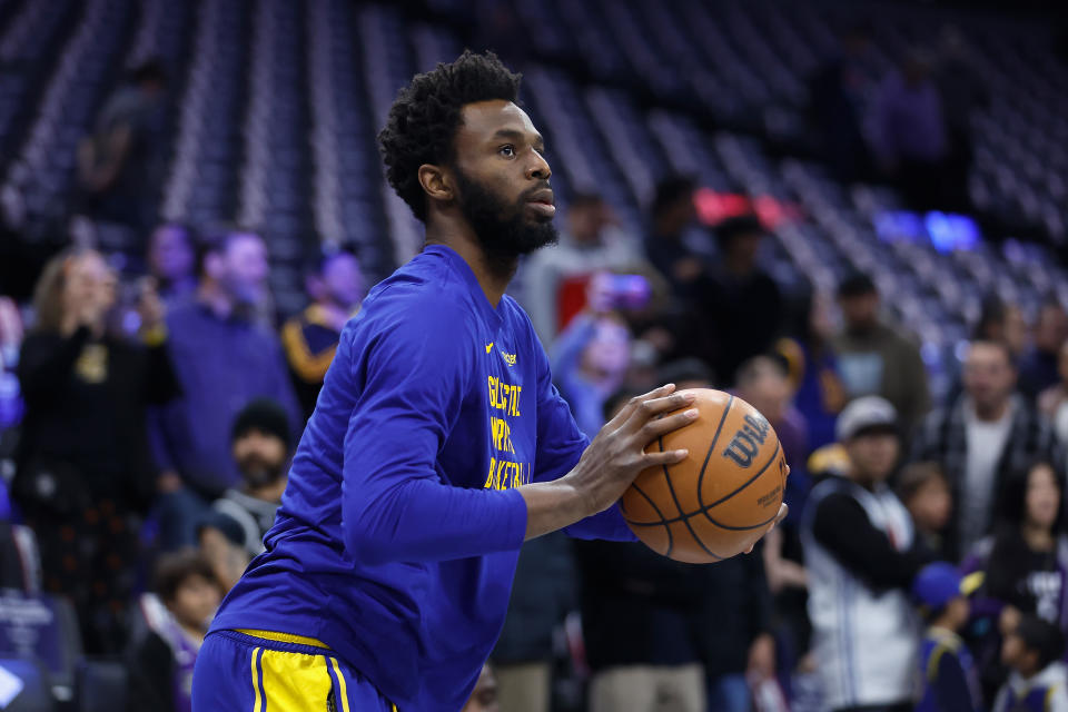 SACRAMENTO, CALIFORNIA - NOVEMBER 28: Andrew Wiggins #22 of the Golden State Warriors warms up before the NBA In-Season Tournament game against the Sacramento Kings at Golden 1 Center on November 28, 2023 in Sacramento, California. NOTE TO USER: User expressly acknowledges and agrees that, by downloading and or using this photograph, User is consenting to the terms and conditions of the Getty Images License Agreement. (Photo by Lachlan Cunningham/Getty Images)