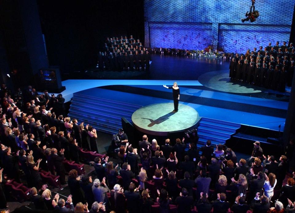 <p>Barbra Streisand performs for the audience several weeks after the 9/11 attacks. Attendees wore black to honor the fallen.</p>