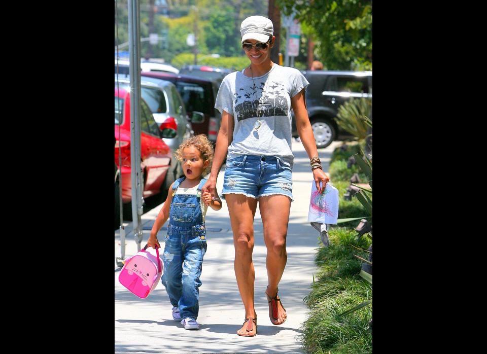 Halle Berry takes an after school walk with daughter Nahla Aubrey in Los Angeles, CA on June 22, 2011. The little overall clad artist colored her mom a picture and carried a pink cartoon backpack!  