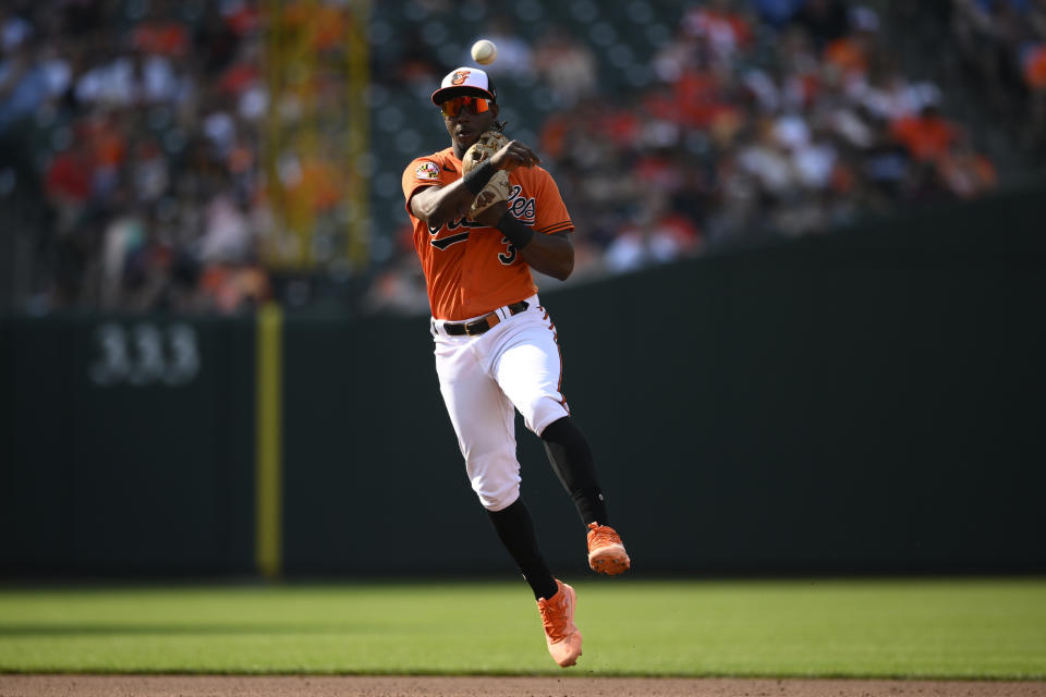 Baltimore Orioles shortstop Jorge Mateo throws to first base to put out Kansas City Royals' Bobby Witt Jr. during the fourth inning of a baseball game, Saturday, June 10, 2023, in Baltimore. (AP Photo/Nick Wass)