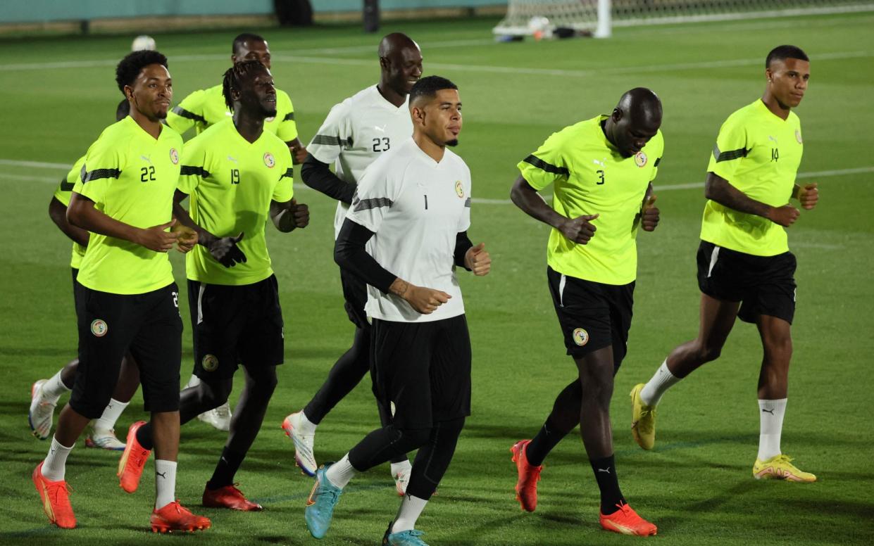 Senegal World Cup 2022 results, squad list, fixtures and latest odds - Senegal's players take part in a training session at Al Duhail SC - Getty Images/Jack Guez