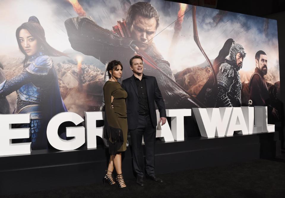 Matt Damon, a cast member in "The Great Wall," poses with his wife Luciana Barroso at the premiere of the film at the TCL Chinese Theatre on Wednesday, Feb. 15, 2017, in Los Angeles. (Photo by Chris Pizzello/Invision/AP)