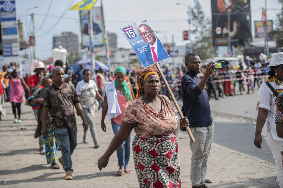 FILE - Supporters greet Congolese opposition presidential candidate and Nobel peace Prize laureate Dr. Denis Mukwege at a rally in Goma, Democratic Republic of the Congo, on Dec. 2, 2023. (AP Photo/Moses Sawasawa, File)