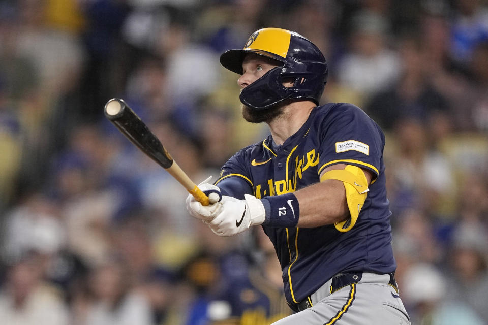 Milwaukee Brewers' Rhys Hoskins hits a grand slam during the fourth inning of a baseball game against the Los Angeles Dodgers Friday, July 5, 2024, in Los Angeles. (AP Photo/Mark J. Terrill)