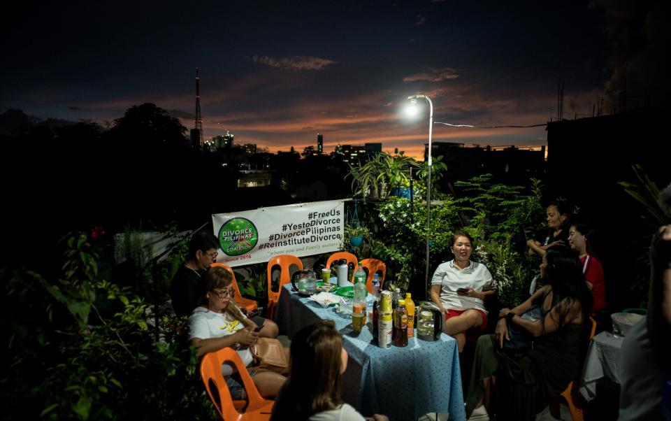 Members of Divorce Pilipinas Coalition gather at a garden rooftop in Quezon City