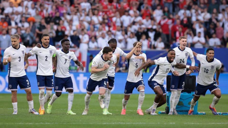 England players celebrate victory in the penalty shootout against Switzerland at Euro 2024