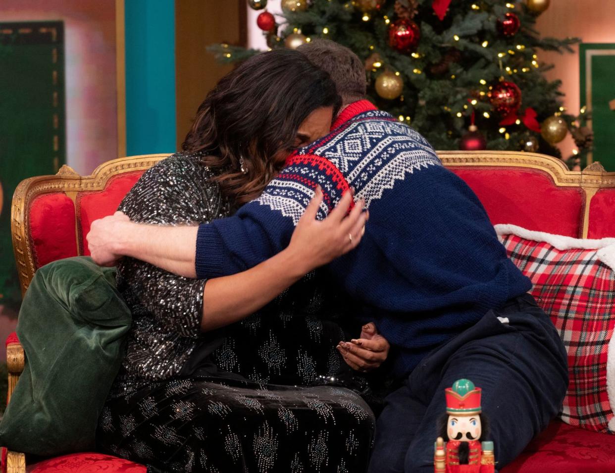alison hammond and dermot o'leary hug on the this morning sofa during the christmas episode