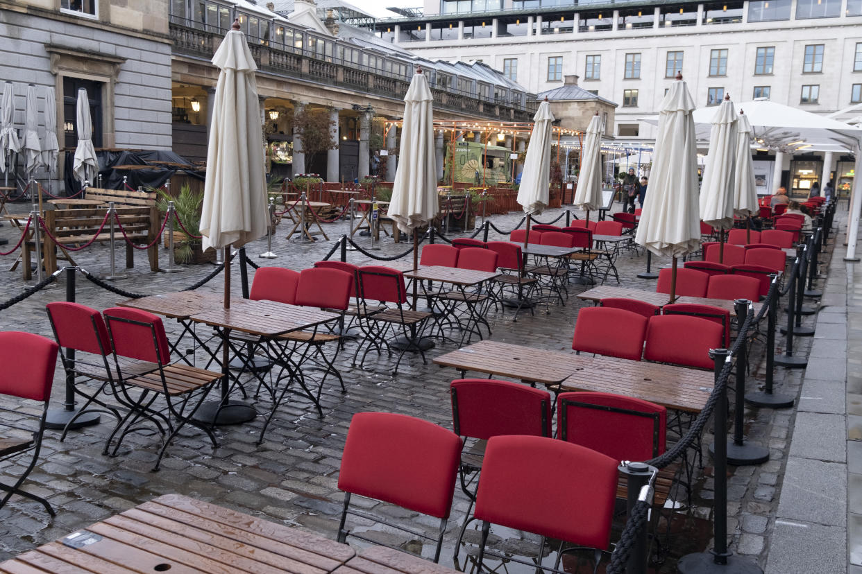 Empty seating awaits bar and restaurant customers on a wet and rainy day in Covent Garden during the second wave of the Coronavirus pandemic and when the capital is designated by the government as a Tier 2 restriction, on 21st October 2020, in London, England. (Photo by Richard Baker / In Pictures via Getty Images)