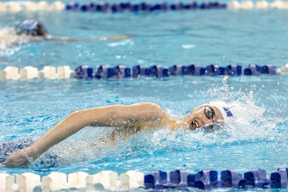 Edmond North's Ryan Healy competes in the 500-yard freestyle during the Class 6A state finals at Edmond Schools Aquatic Center on Friday.