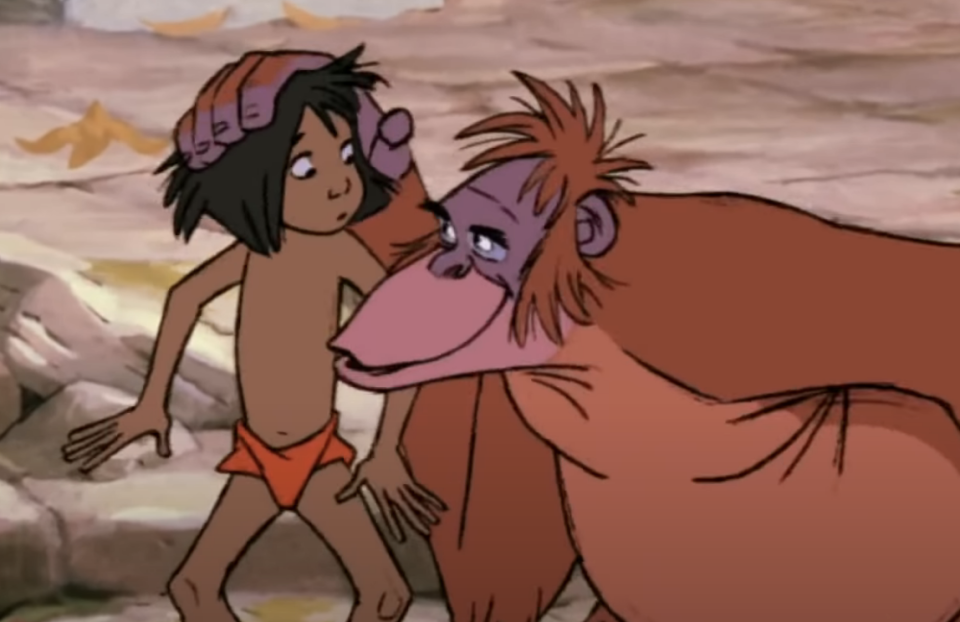 mowgli and one of the apes