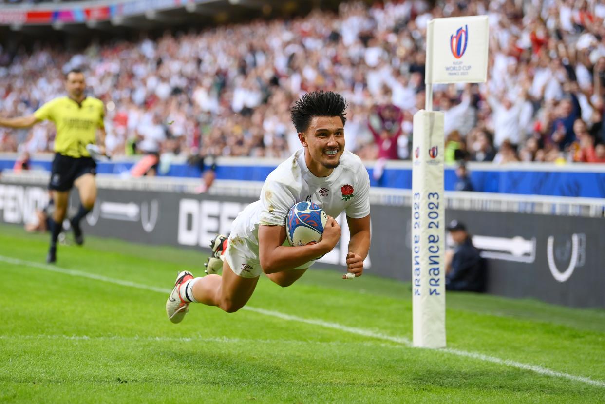 Marcus Smith flies into the corner to score England’s fifth try (Getty Images)