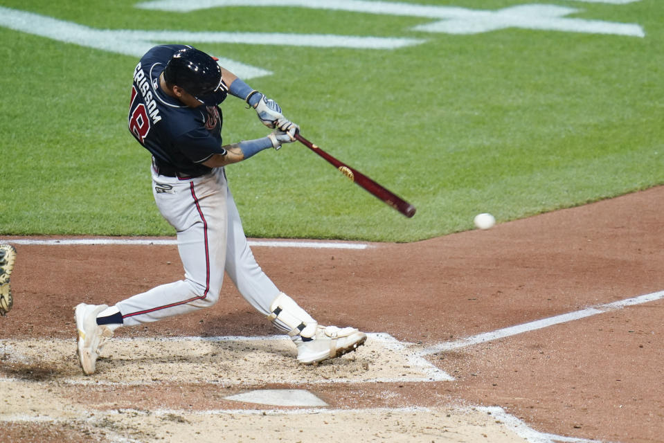 Atlanta Braves' Vaughn Grissom drives a pitch by Pittsburgh Pirates starting pitcher JT Brubaker for a single, driving in Michael Harris II during the fifth inning of a baseball game, Tuesday, Aug. 23, 2022, in Pittsburgh. (AP Photo/Keith Srakocic)