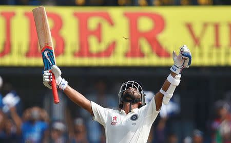 Cricket - India v New Zealand - Third Test cricket match - Holkar Cricket Stadium, Indore, India - 09/10/2016. India's Ajinkya Rahane celebrates after scoring his century. REUTERS/Danish Siddiqui