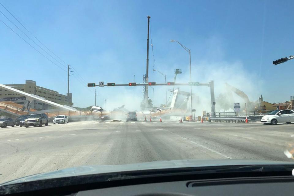 This shocking image shows the seconds after the bridge collapsed in Miami (Twitter)