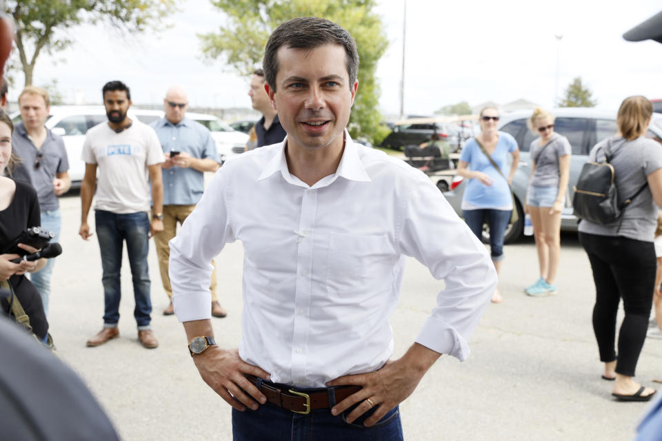 Democratic presidential candidate Pete Buttigieg talks with attendees at the Hawkeye Area Labor Council Labor Day Picnic, Monday, Sept. 2, 2019, in Cedar Rapids, Iowa. (AP Photo/Charlie Neibergall)