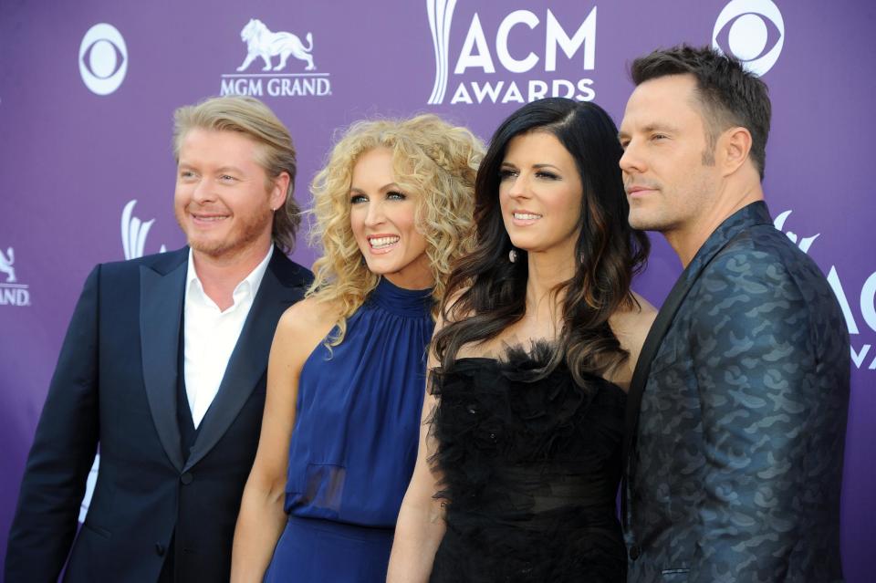 From left, Phillip Sweet, Kimberly Schlapman, Karen Fairchild and Jimi Westbrook, of musical group Little Big Town, arrive at the 48th Annual Academy of Country Music Awards at the MGM Grand Garden Arena in Las Vegas on Sunday, April 7, 2013. (Photo by Al Powers/Invision/AP)