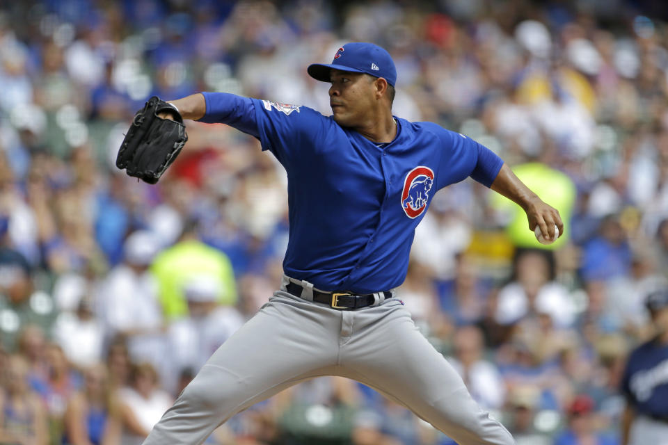 Chicago Cubs' Jose Quintana pitches during the first inning of a baseball game against the Milwaukee Brewers, Sunday, July 28, 2019, in Milwaukee. (AP Photo/Aaron Gash)