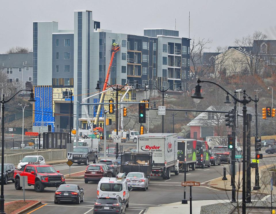 Traffic and development go hand in hand in Quincy. The view is from Hancock Street toward Burgin Parkway down Hannon Parkway. A new multifloor development under construction is in the background.