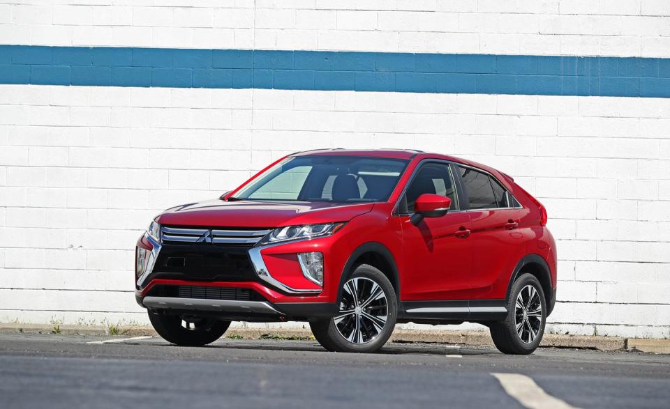 <p><a rel="nofollow noopener" href="https://www.caranddriver.com/mitsubishi/eclipse-cross" target="_blank" data-ylk="slk:The Eclipse Cross;elm:context_link;itc:0;sec:content-canvas" class="link ">The Eclipse Cross </a>borrows its name from one of Mitsubishi's legendary (and discontinued) sports cars, but doesn't provide the driving satisfaction worthy of the title. Instead, the Eclipse Cross is a wildly styled but otherwise entirely average crossover. It has more character than Mitsu's Outlander, as well as a turbocharged four-cylinder engine, and those are pretty much the extent of its highlights.</p>