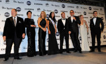 LAS VEGAS, NV - JANUARY 14: Judges appear with Laura Kaeppeler (4th L), Miss Wisconsin, during a news conference after she was named the new Miss America during the 2012 Miss America Pageant at the Planet Hollywood Resort & Casino January 14, 2012 in Las Vegas, Nevada. Judges (L-R) are television personality and writer Raul de Molina, television personality Kris Jenner, journalist Lara Spencer, fitness trainer Chris Powell, producer Mike Fleiss, actress Teri Polo and dancer Mark Ballas. (Photo by Ethan Miller/Getty Images)