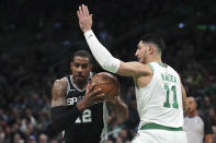 Boston Celtics center Enes Kanter (11) tries to block San Antonio Spurs center LaMarcus Aldridge (12) during the first half of an NBA basketball game Wednesday, Jan. 8, 2020 in Boston. (AP Photo/Charles Krupa)