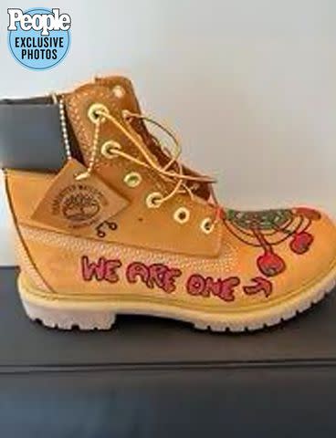 <p>Courtesy of Alan Hamel</p> The left boot Hamel gave Somers which featured the words "we are one."
