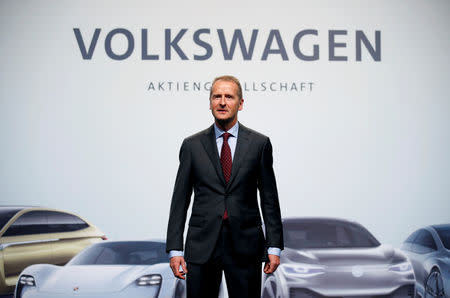FILE PHOTO: Herbert Diess, Volkswagen's new CEO, poses during the Volkswagen Group's annual general meeting in Berlin, Germany, May 3, 2018. REUTERS/Axel Schmidt/File Photo