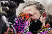Katie Wright, mother of Daunte Wright, cries as she speaks during a news conference in snowfall, Tuesday, April 13, 2021, in Minneapolis. Daunte Wright, 20, was shot and killed by police Sunday after a traffic stop in Brooklyn Center, Minn. (AP Photo/John Minchillo)