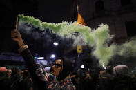 <p>A woman in support of decriminalizing abortion spreads colored smoke outside Congress after lawmakers voted against an abortion bill in Buenos Aires, Argentina, early Thursday, Aug. 9, 2018. (Photo: Natacha Pisarenko/AP) </p>