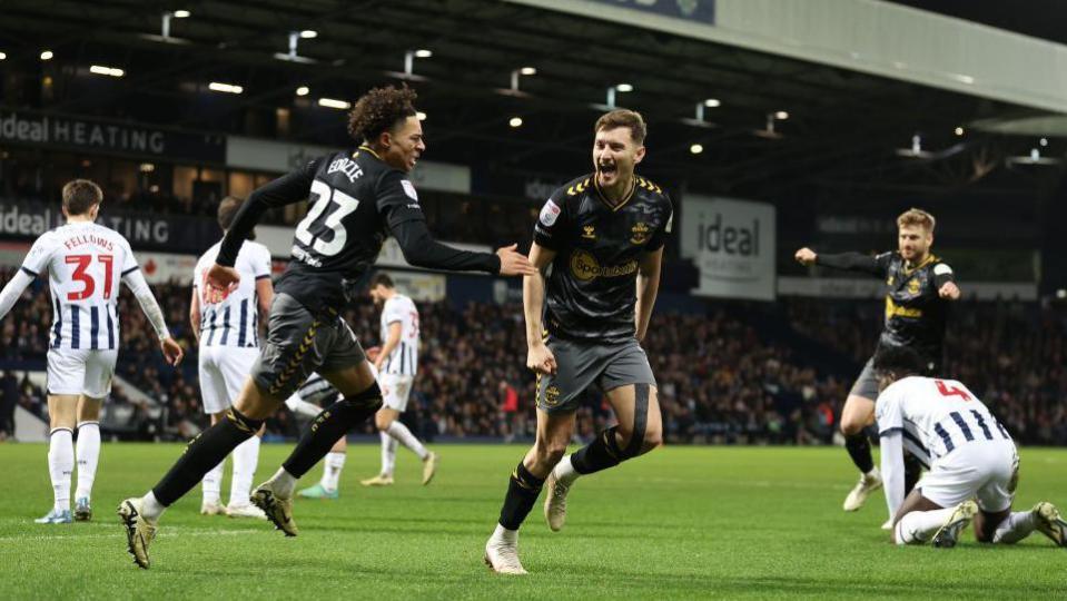 David Brooks of Southampton celebrates scoring his team's clinching second goal with teammate Samuel Edozie on this season's previous visit to The Hawthorns in February