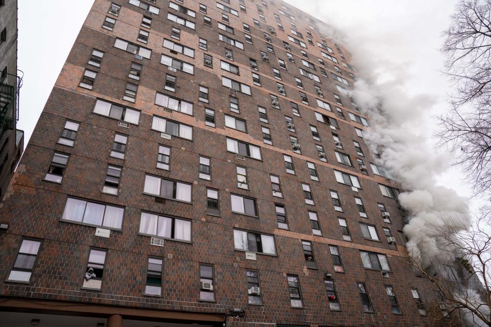 UNITED STATES -January 9: Thirty people including several children were critically injured, with firefighters making dramatic rescues using tower ladders and ladders, after a fire broke out inside a third floor duplex apartment at 333 East 181st Street in the Bronx on Sunday January 9, 2022. 1118. Seven additional people were also injured.  (Photo by Theodore Parisienne/NY Daily News via Getty Images)